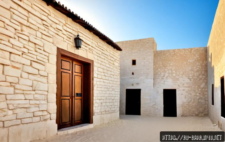 Home 17 바레인의 전통 주택 - Photorealistic exterior of a traditional Bahraini courtyard house in Muharraq, weathered coral-stone...
